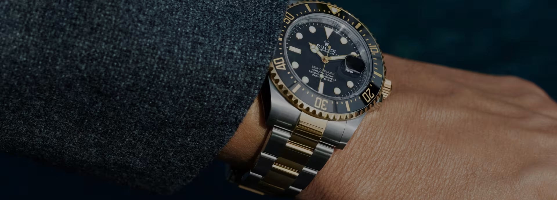 A two-tone Rolex Sea-Dweller worn on the wrist